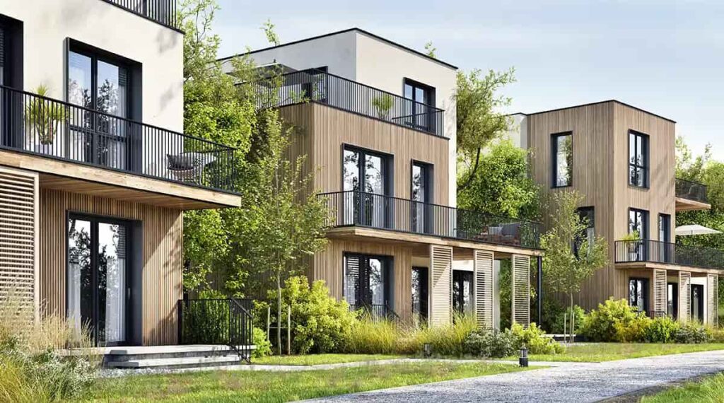 Moderne Wohnh&auml;user im Gr&uuml;nen als Beispiel f&uuml;r geeignete Kapitalanlage-Immobilien.